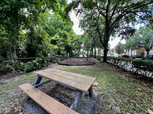 Building Photo - NEW-Remodeled bathroom & kitchen! NEW VINYL PLANK flooring & fresh paint! 2 bedroom 1 bath condo ...