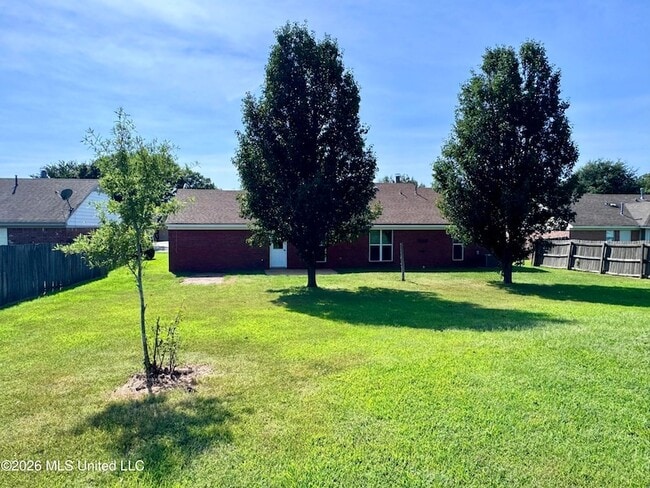 Building Photo - 6918 Amanda Dr N