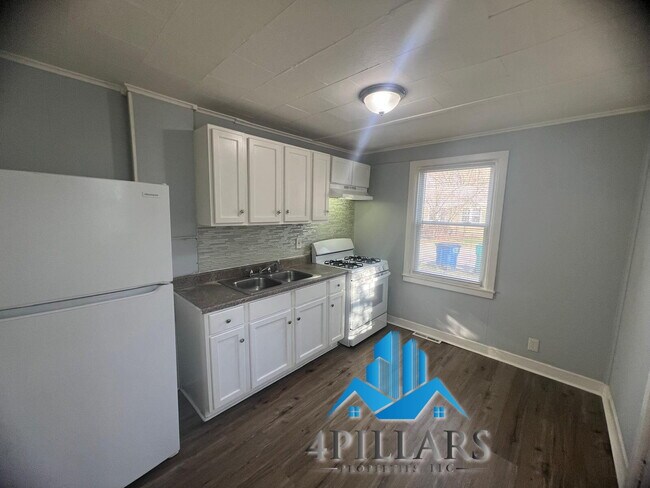 Building Photo - Charming 2 Bedroom Duplex in La Porte with Spacious Layout and Prime Location