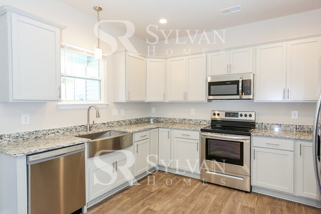 Building Photo - Enjoy living the good life in this 3 bedroom, 2.5 bathroom townhome