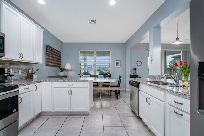 Building Photo - AWESOME 4 BDRM HOME IN GATED LEGACY PARK!