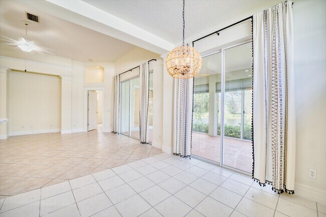 Building Photo - 2 Bedroom Plus Den/Office Home - Relaxing Pond View and Pet Friendly