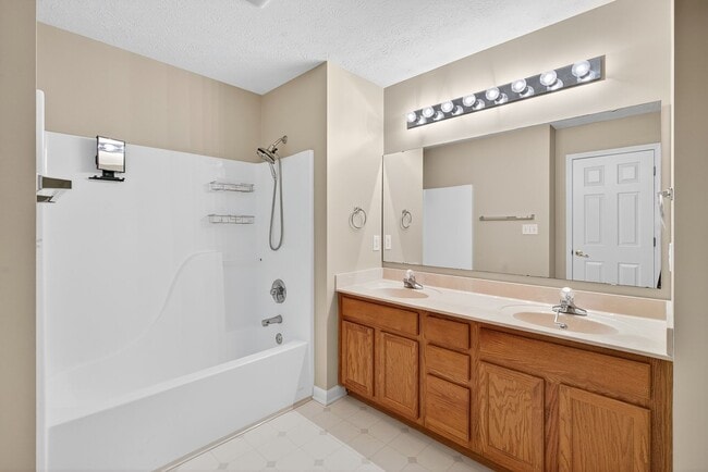 Building Photo - Charming Fishers Condo – Move-In Ready