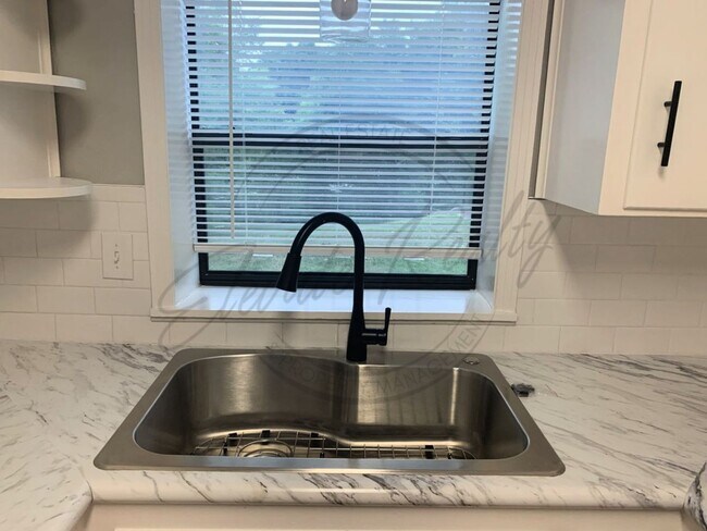 Building Photo - ON SPECIAL! THIS PROPERTY HAS A 1/2 OFF TH...