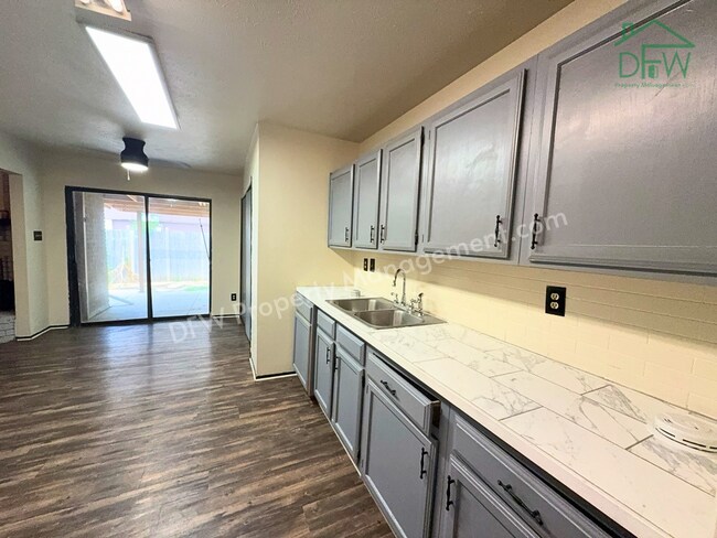 Building Photo - Cozy 3-Bedroom Home with Fireplace, Covered Patio & Large Fenced Backyard for Lease