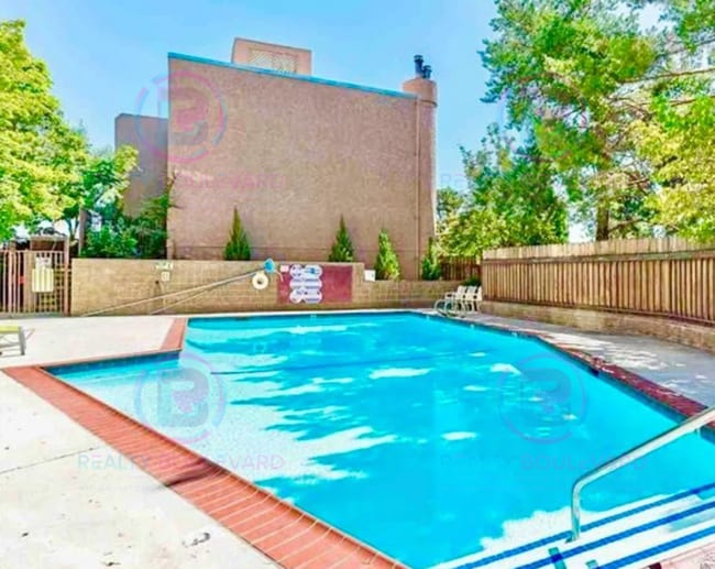 Building Photo - Incredible condo near UNR! This charming 2...