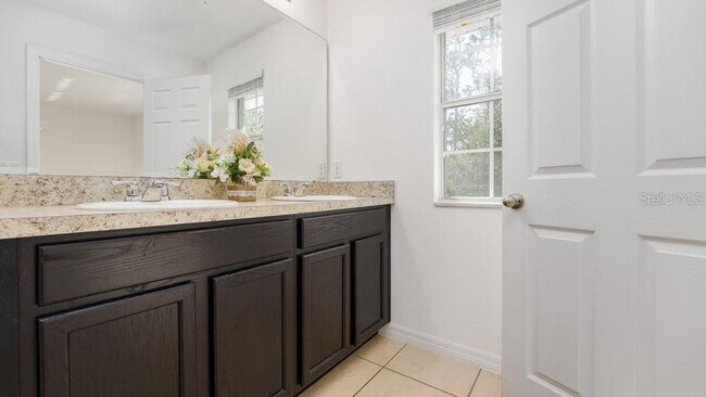 Building Photo - 3 Bedroom 3 Bath Kissimmee Emerald Lake Townhome with 2 Master Suites and Stainless Appliances!