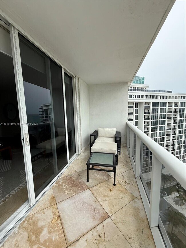 Building Photo - 10275 Collins Ave