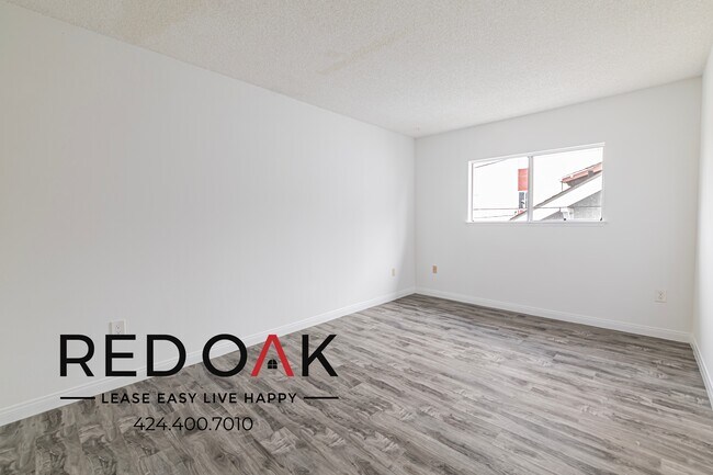 Building Photo - 1341 W 37th Pl