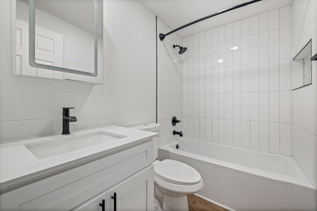 Bathroom with tile surround - Rosedale Townhomes