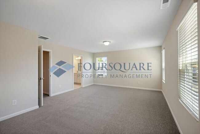 Building Photo - End-Unit Townhome with Loft, Open Floor Plan & Patio, Conveniently Located Near Dining, Shopping,...