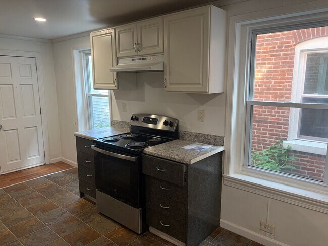 Building Photo - Charming 3 Story Brick Townhome Now Available