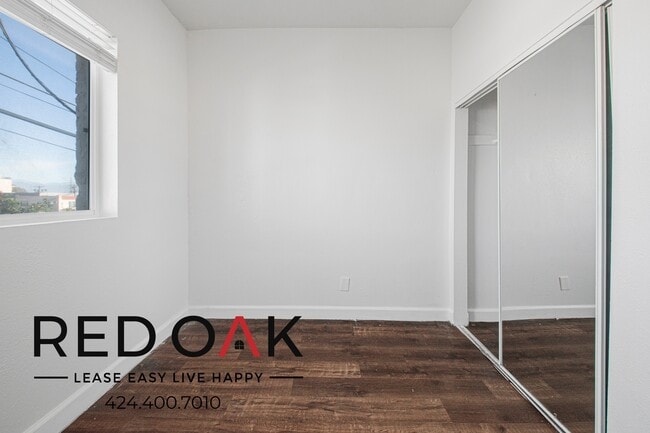 Building Photo - 1847 1/2 W Florence Ave