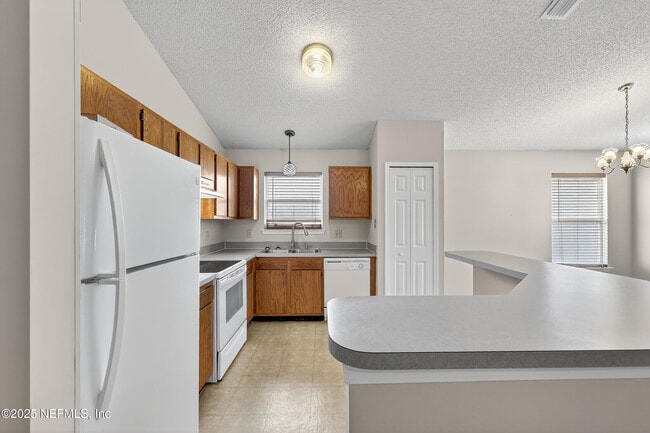 Building Photo - 12119 Cancun Dr