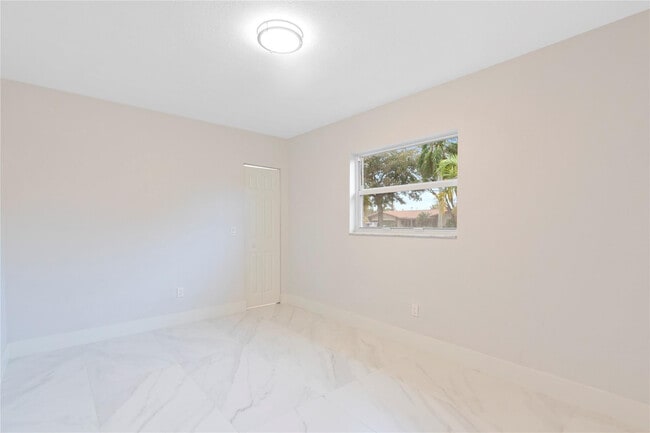 Building Photo - 4490 NW 8th St