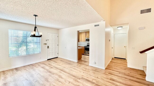 Building Photo - Beautiful, End Unit Condo, in the Very Des...