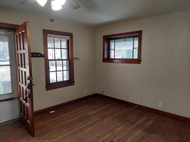Gorgeous woodwork throughout, including original hardwood floors. - 1201 N Madison St