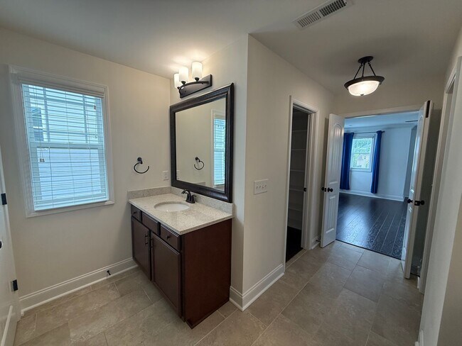 Building Photo - 4 Bedroom Home on a Cul-de-Sac with Lawn Care Included!