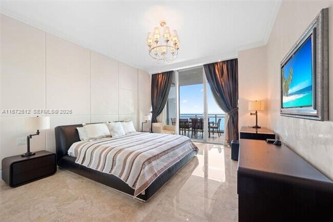 Building Photo - 10295 Collins Ave