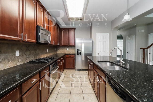 Building Photo - This is Tailored to Your Highest Standards.