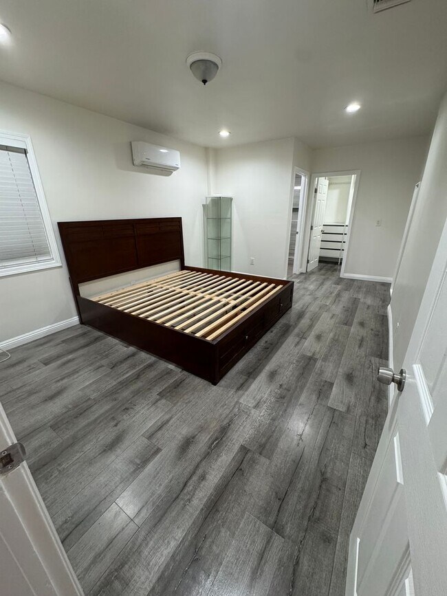 Building Photo - Home with a Cabin Style Family room and backyard Oasis