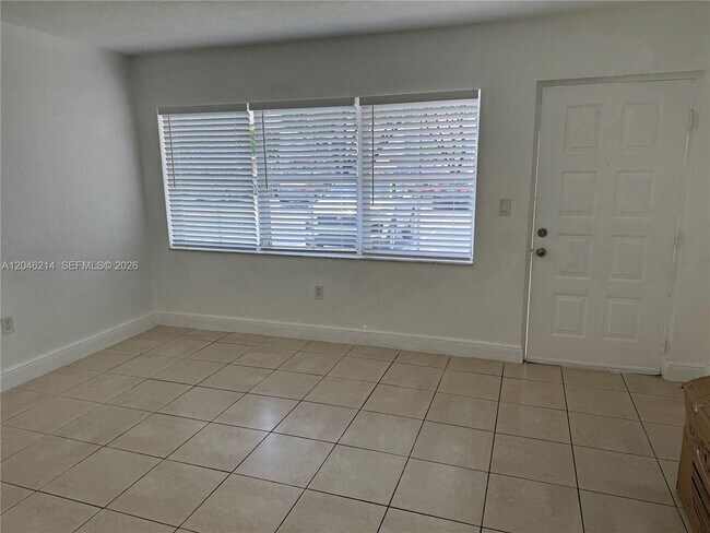 Building Photo - 8695 NW 6th Ln