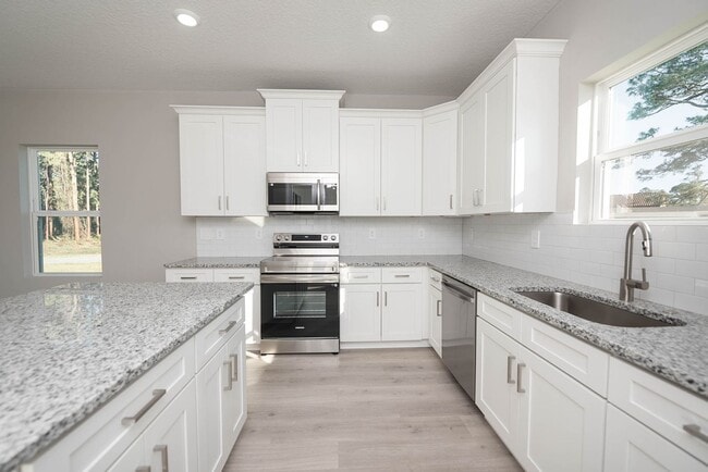 Building Photo - Peaceful and Private setting new construct...