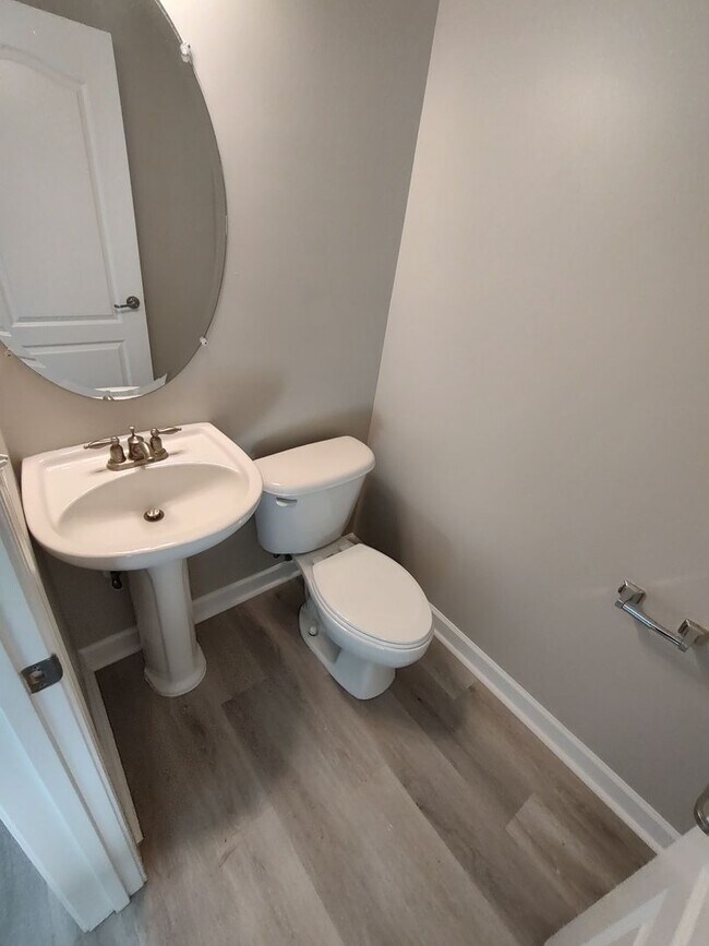 Building Photo - BRAND NEW FLOORING & FRESH PAINT - 3 Bedroom/2.5 Bath Townhome with garage in Wild Wing!