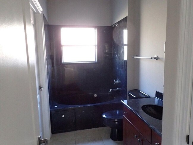 Building Photo - 9047 Orlando Ave