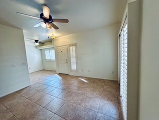 Building Photo - Cozy 1st-floor condo unit with 2 bedrooms and 2 bathrooms. Located in a guard-gated community in ...