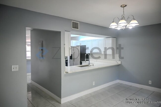 Building Photo - 9761 Riverside Dr