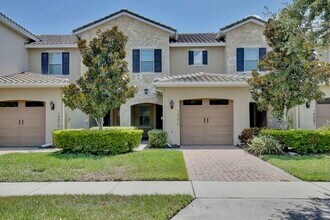 Building Photo - Elegant 2/2.5 Townhome in Guard-Gated Eagl...
