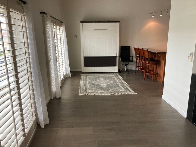 Building Photo - Beachside Furnished Retreat! Remodeled 2BD/2BA Condo Steps from the Sand!
