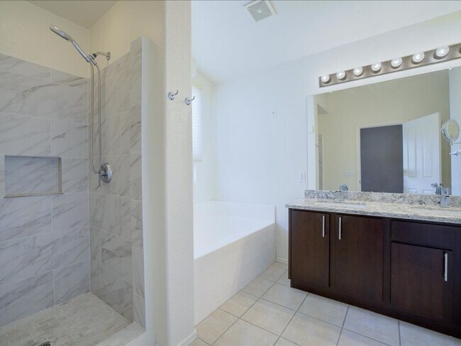 Building Photo - Spacious 4-Bedroom Home with Private Pool & Large Enclosed Backyard!