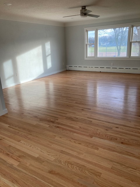 Living room with south-facing picture window for so much light. - 1430 4th St N