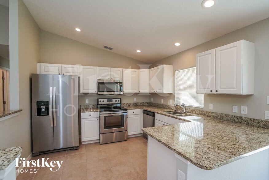 Building Photo - 12087 Helios Ave