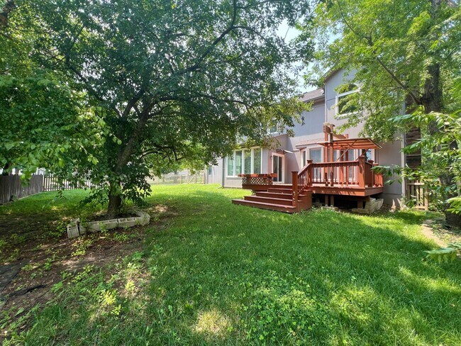 Building Photo - SEE IT NOW: Spacious 4-Bed Home with Finis...