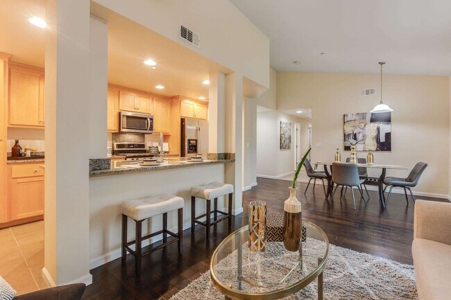 Building Photo - Stunning Top-Floor Condo with Open Layout, Modern Upgrades, and Prime Location 6 MONTH LEASE