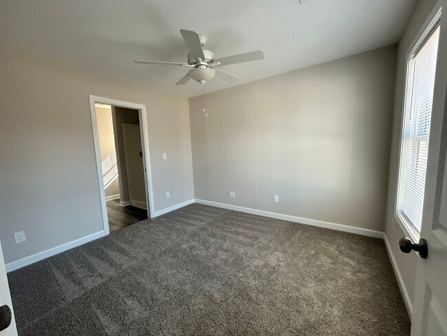 Building Photo - Three bedroom three bath available now!