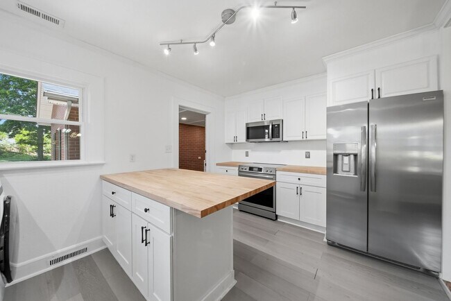 Building Photo - Serene 3BR Ranch with Spacious Yard & Updated Interiors