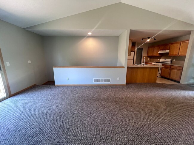 Building Photo - Spacious Duplex in Walker! Two Stall Garage!