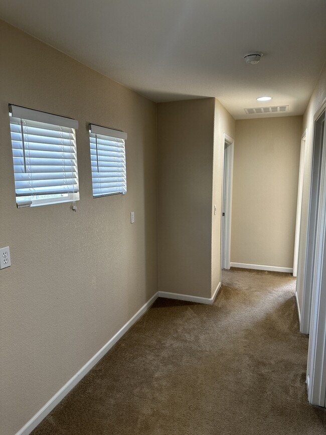Building Photo - This stunning corner home offers 4 spaciou...