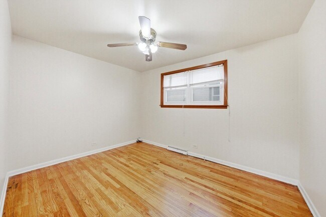 Building Photo - 4605 S Laramie Ave
