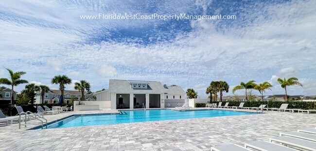 Building Photo - EXCEPTIONAL AND SPACIOUS FURNISHED TOWNHOME WITHIN WATERSIDE- NAUTIQUE!