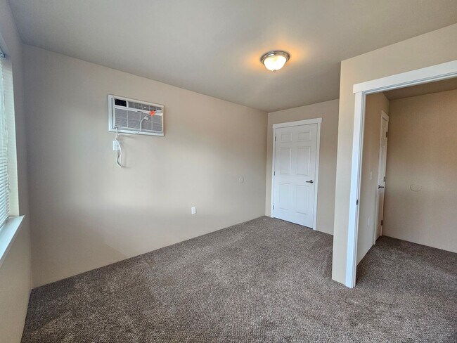 Building Photo - 5207-5207 E Upriver Dr