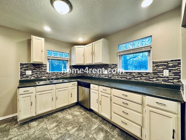 Building Photo - Adorable Home Featuring Wood Floors, SS Ap...