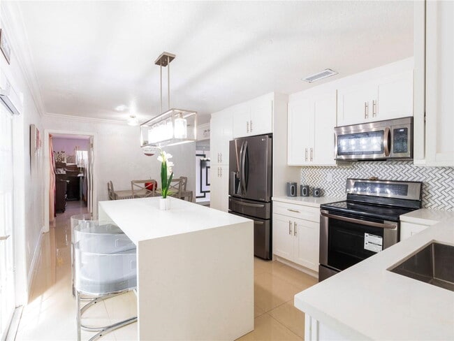 Building Photo - Northwest 58th Court, Miami, FL 33126 - 3 BR 2 BA single-family home