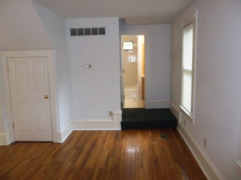 Living room toward stairs & bath - 1018 Mississippi St