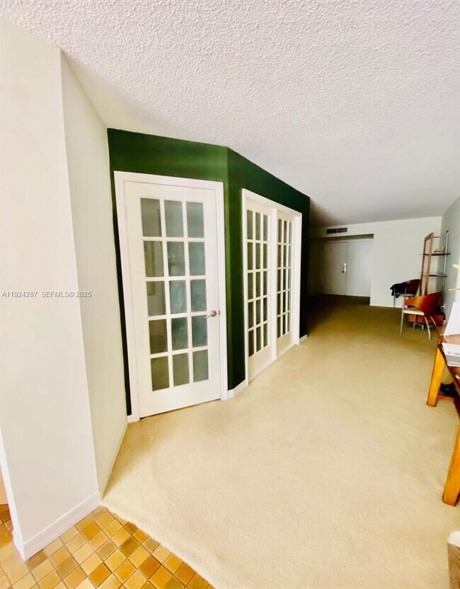 Building Photo - 6423 Collins Ave