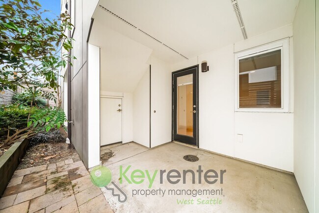 Building Photo - **Rent Special** Modern Two Bedroom Townhome with Designated Parking